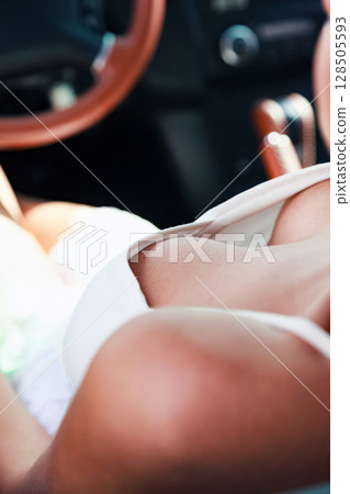 Sexy woman driver in a car Sexy woman driver in a car 128505593
