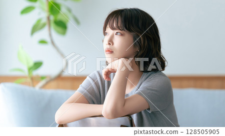 A woman thinking 128505905