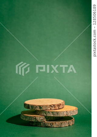 wooden stand against a green background wooden stand against a green background 128506189