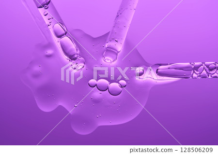 Demonstration of the texture of hyaluronic serum on a lilac background. Demonstration of the texture of hyaluronic serum on a lilac background. 128506209