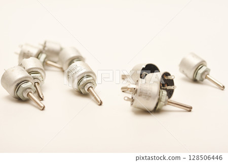 Potentiometers. Variable resistors. Devices for voltage changes. 128506446