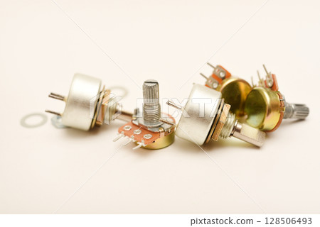 Potentiometers. Variable resistors. Devices for voltage changes. 128506493