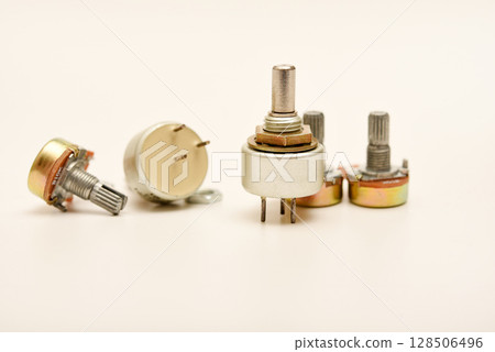 Potentiometers. Variable resistors. Devices for voltage changes. 128506496