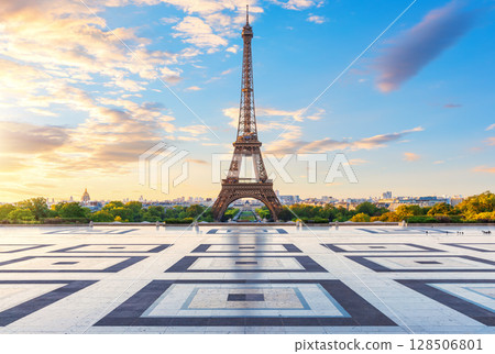 Eiffel Tower at sunrise, main landmark of Paris, France Eiffel Tower at sunrise, main landmark of Paris, France 128506801
