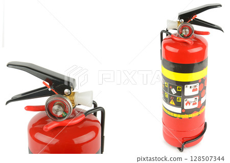 Household fire extinguisher isolated on white background. Household fire extinguisher isolated on white background. 128507344