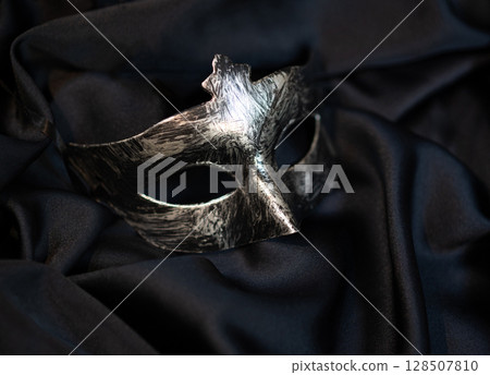 Carnival masquerade man mask, mysterious accessory for a party 128507810