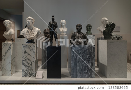a display of various sculptures and busts presented within the main entrance area of the National Portrait Gallery. a display of various sculptures and busts presented within the main entrance area of the National Portrait Gallery. 128508635