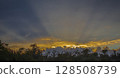 Beautiful rays of the evening sun and cloudy landscape before an evening thunderstorm in South Africa. 128508739