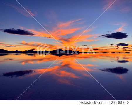 Orange sunset clouds Orange sunset clouds 128508830