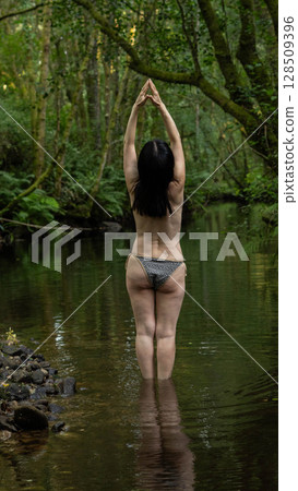 Woman in Natural Harmony 128509396