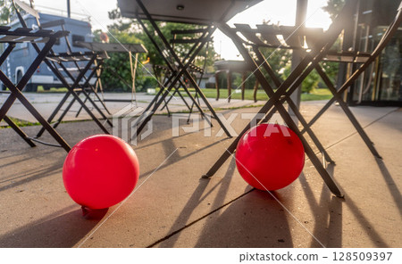 Red Balloons at Sunset 128509397