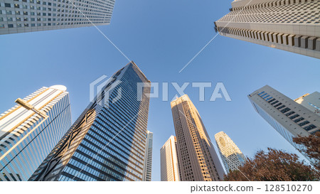 Looking up at the buildings of Shinjuku New City in the evening, Tokyo Looking up at the buildings of Shinjuku New City in the evening, Tokyo 128510270
