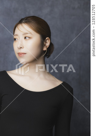 Beauty portrait on a black background Beauty portrait on a black background 128512705