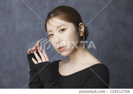 Beauty portrait on a black background 128512708