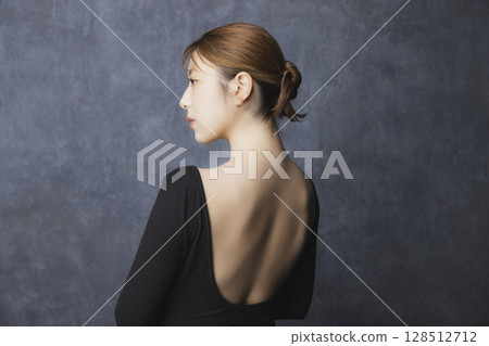 Beauty portrait on a black background 128512712