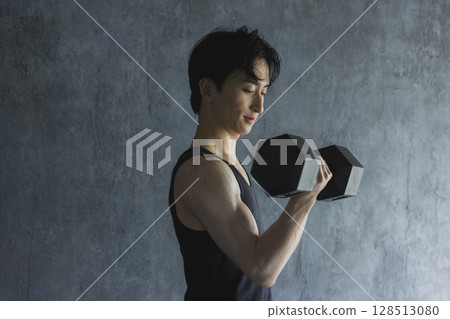 Men training with dumbbells Men training with dumbbells 128513080