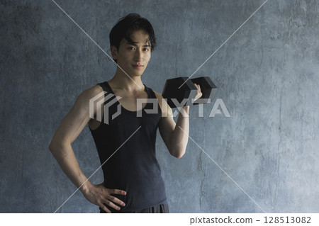 Men training with dumbbells Men training with dumbbells 128513082