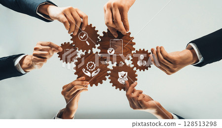 Collaborative Business Strategy with Gears Symbolizing Teamwork and Process Optimization in Professional Environment. Amity 128513298