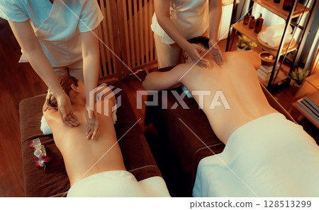 Caucasian couple customer enjoying relaxing anti-stress massage. Quiescent 128513299