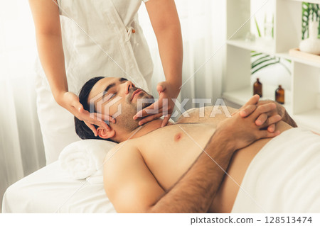 Caucasian man enjoying relaxing anti-stress head massage. Quiescent 128513474
