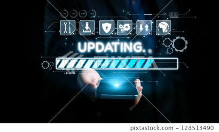 Hand Holding Smartphone with Digital Updating Icon and Progress Bar on Futuristic Background Representing Technology and Connectivity in Modern Life. Qubit 128513490