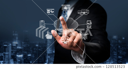 Professional in Business Suit Interacting with Cloud Computing Visuals for Web Development and Online Solutions in Modern Digital Landscape XDMCP Professional in Business Suit Interacting with Cloud Computing Visuals for Web Development and Online Solutions in Modern Digital Landscape XDMCP 128513523