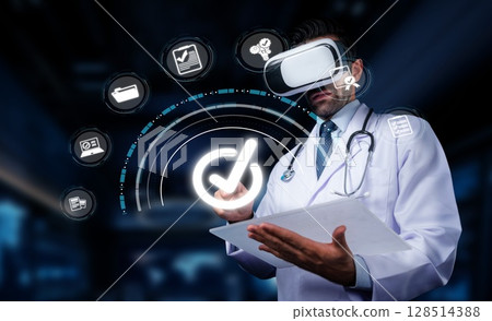 Medical Professional Using Virtual Reality Technology for Healthcare Innovation and Patient Treatment Analysis in Modern Medical Environment. PHMT 128514388