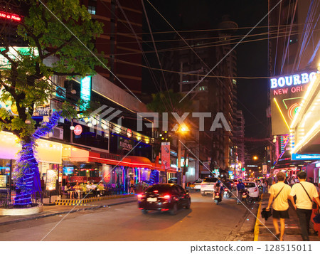 The Philippines in Action - Evening view of the bustling Burgos Street in Manila Cityscape (May 2025) 128515011