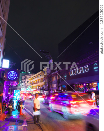 The Philippines in Action - Evening view of the bustling Burgos Street in Manila Cityscape (June 2025) 128515092