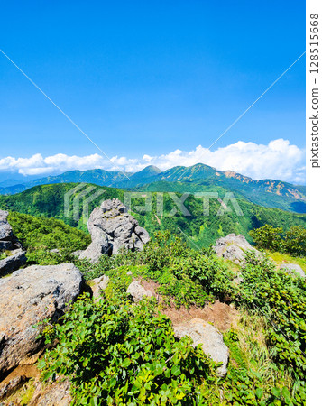 Climbing Mt. Myoko in summer (view of Mt. Yakeyama and Mt. Hiuchiyama from the top of the northern peak) 128515668