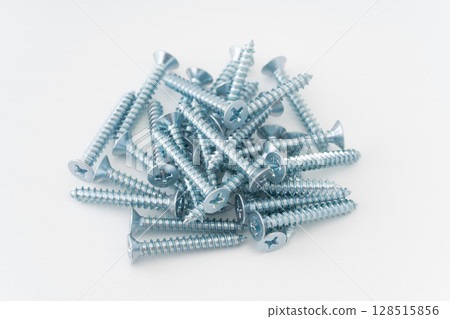 Tapping screw on white background 128515856