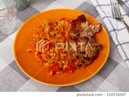 Barley with cabbage served with fried brisket Barley with cabbage served with fried brisket 128516047