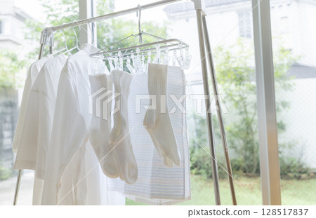 Drying the laundry in the room image Drying the laundry in the room image 128517837