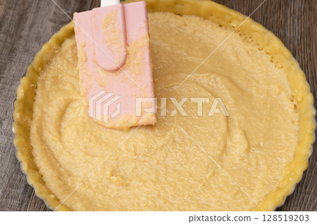 Make the almond cream and pour it into the tart dough. Make the almond cream and pour it into the tart dough. 128519203