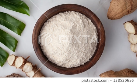 Cassava flour on brown wooden bowl and some fruits for baking, gluten free copy space 128520656