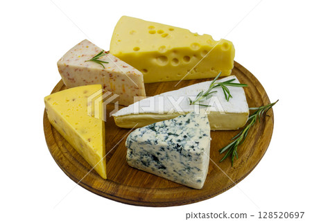 Set of various types of cheese on wooden cutting board isolated on white background 128520697