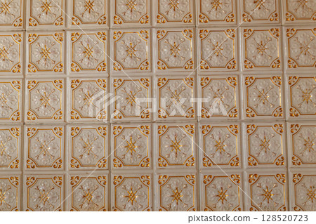 Old vintage ceramic tiles for decoration stoves, wall and floor. Background, texture, seamless pattern Old vintage ceramic tiles for decoration stoves, wall and floor. Background, texture, seamless pattern 128520723