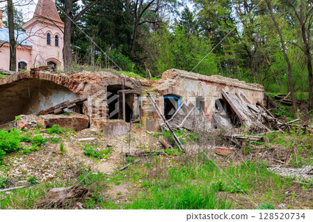 The ruins of a destroyed building 128520734