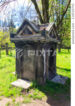 Old stone crypt on the ancient cemetery Old stone crypt on the ancient cemetery 128520743