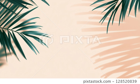 Green palm leaves of the edge frame decoration botanical nature copy space peach background 128520839