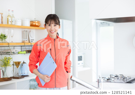 House cleaning female staff portrait 128521141