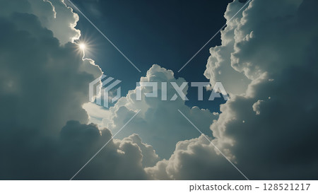Radiant Sunlight Bursting Through Fluffy Clouds, Creating a Majestic and Serene Sky View with Dramatic Light and Shadow Displaying the Beauty of Nature's Canvas 128521217