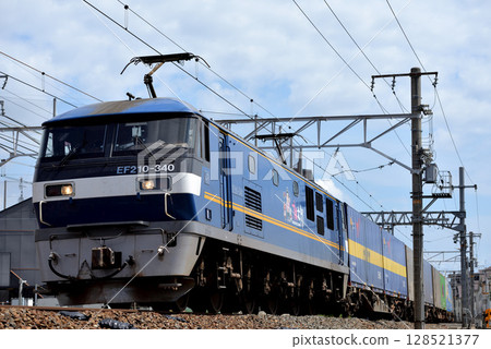 EF210-340 container freight train running on the Tokaido Main Line EF210-340 container freight train running on the Tokaido Main Line 128521377