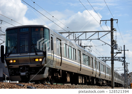 223 series 1000 series express train running on the Tokaido Main Line 223 series 1000 series express train running on the Tokaido Main Line 128521394