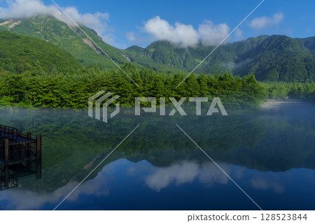 Kamikochi in July: Taisho Pond in the morning mist Kamikochi in July: Taisho Pond in the morning mist 128523844