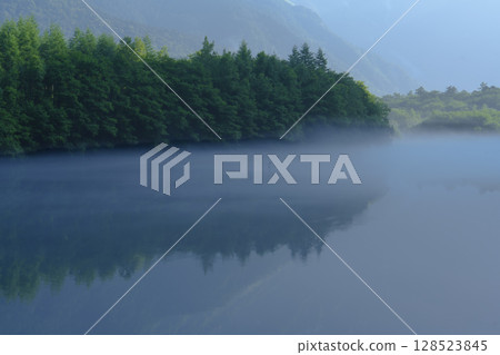 Kamikochi in July: Taisho Pond in the morning mist Kamikochi in July: Taisho Pond in the morning mist 128523845