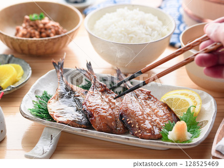 A steaming Japanese breakfast of dried horse mackerel with mirin and rice 128525469