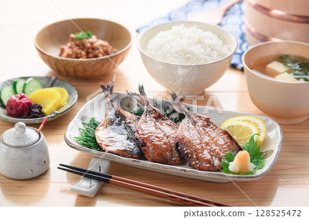 A steaming Japanese breakfast of dried horse mackerel with mirin and rice 128525472