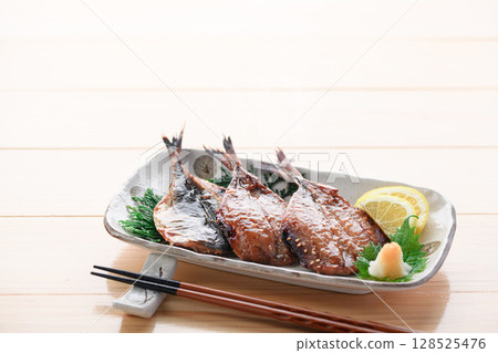A steaming Japanese breakfast of dried horse mackerel with mirin and rice 128525476