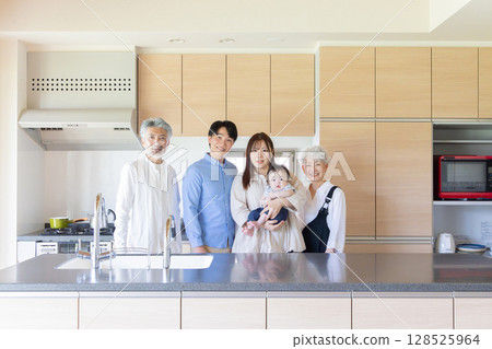 Three generations family surrounding the baby 128525964